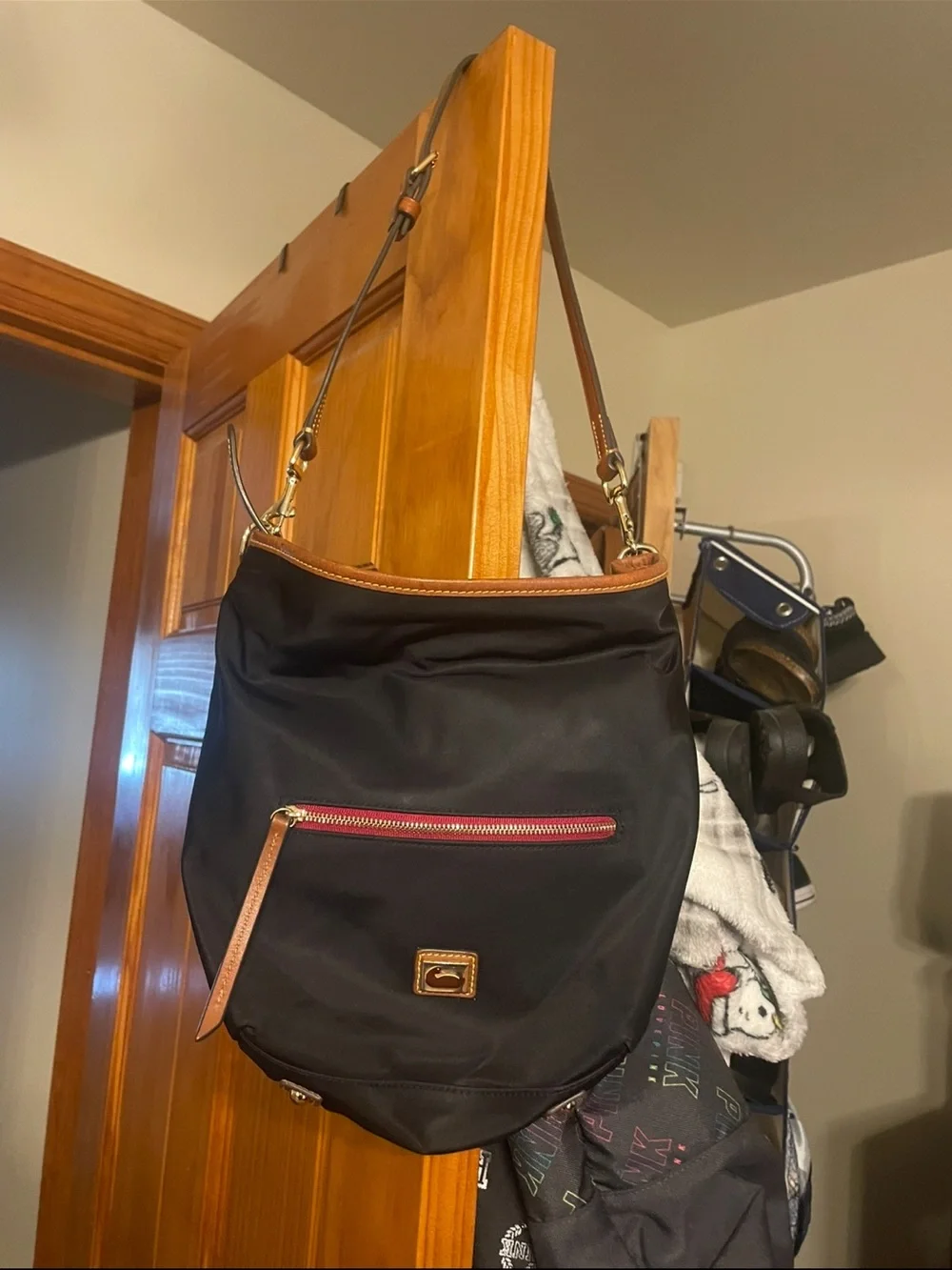 Dooney & Bourke Black Nylon Hobo with Tan Leather Trim and Red Zip